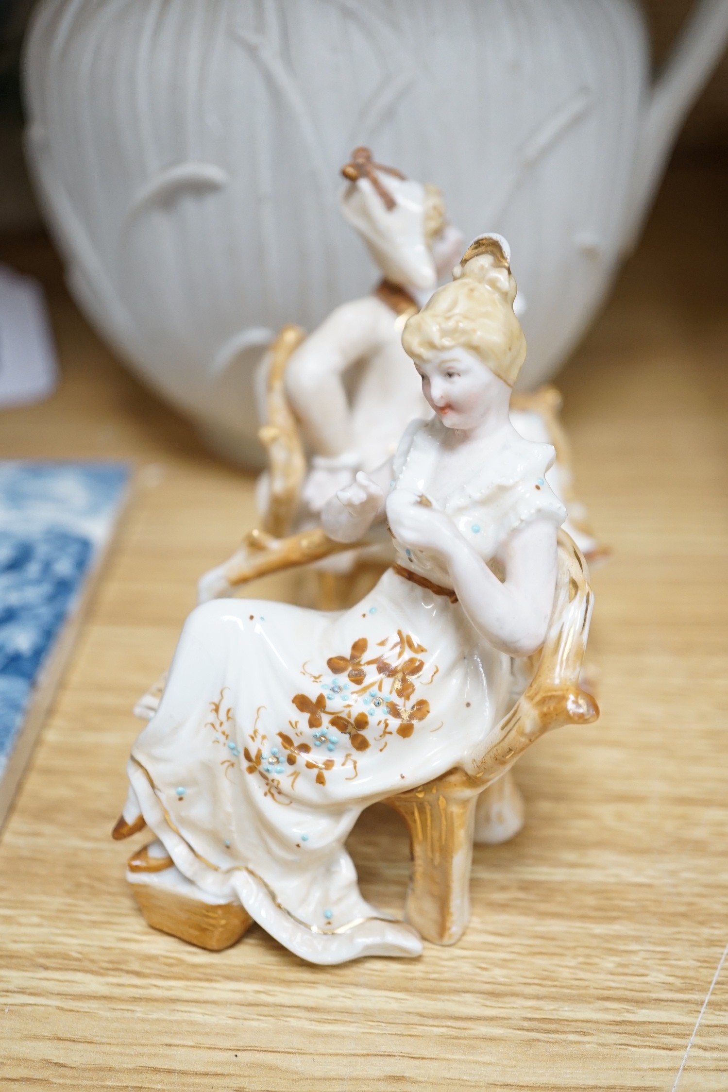 Two late 19th century Meissen waisted vases, 24.5cm one painted with a courting couple and flowers, the other with a floral bouquet together with a Wedgwood ‘June’ tile and other European ceramics